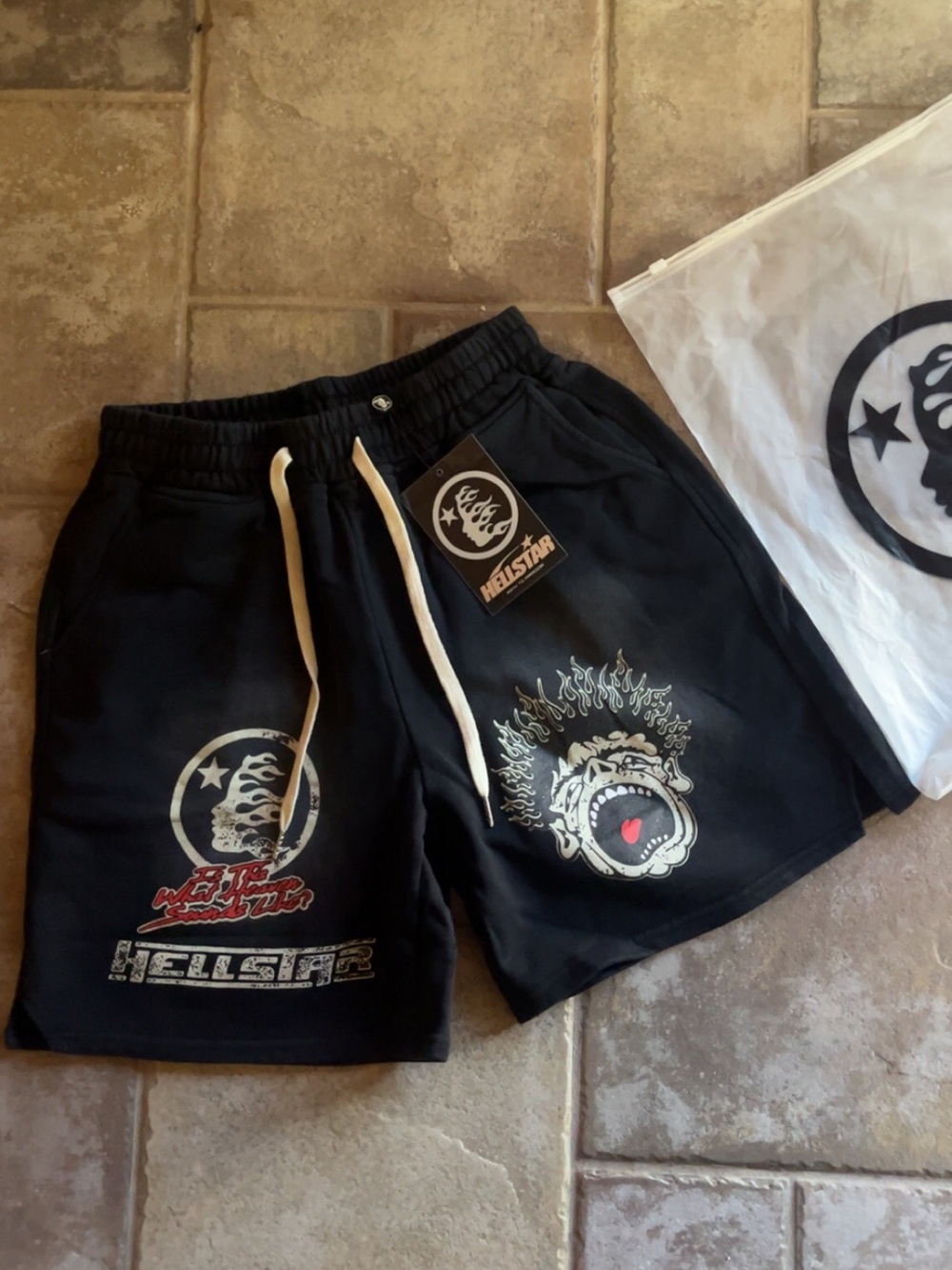Black Hellstar Studios Scream Face Graphic sweat shorts in size Large.